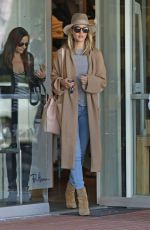 ROSIE HUNTINGTON-WHITELEY Leaves Fred Segal in West Hollywood 03/15/2016