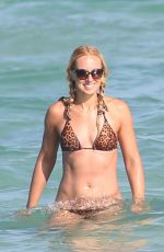 SABINE LISICKI in Bikini at a Beach in Miami 03/26/2016