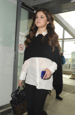 SELENA GOMEZ at Heathrow Airport in London 03/11/2016