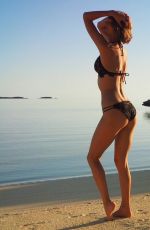 TAYLOR SWIFT in Bikini on the Beach with Boyfriend 03/15/2016