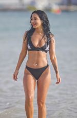 TULISA CONTOSTAVLOS in Bikini at a Beach in Dubai 03/19/2016