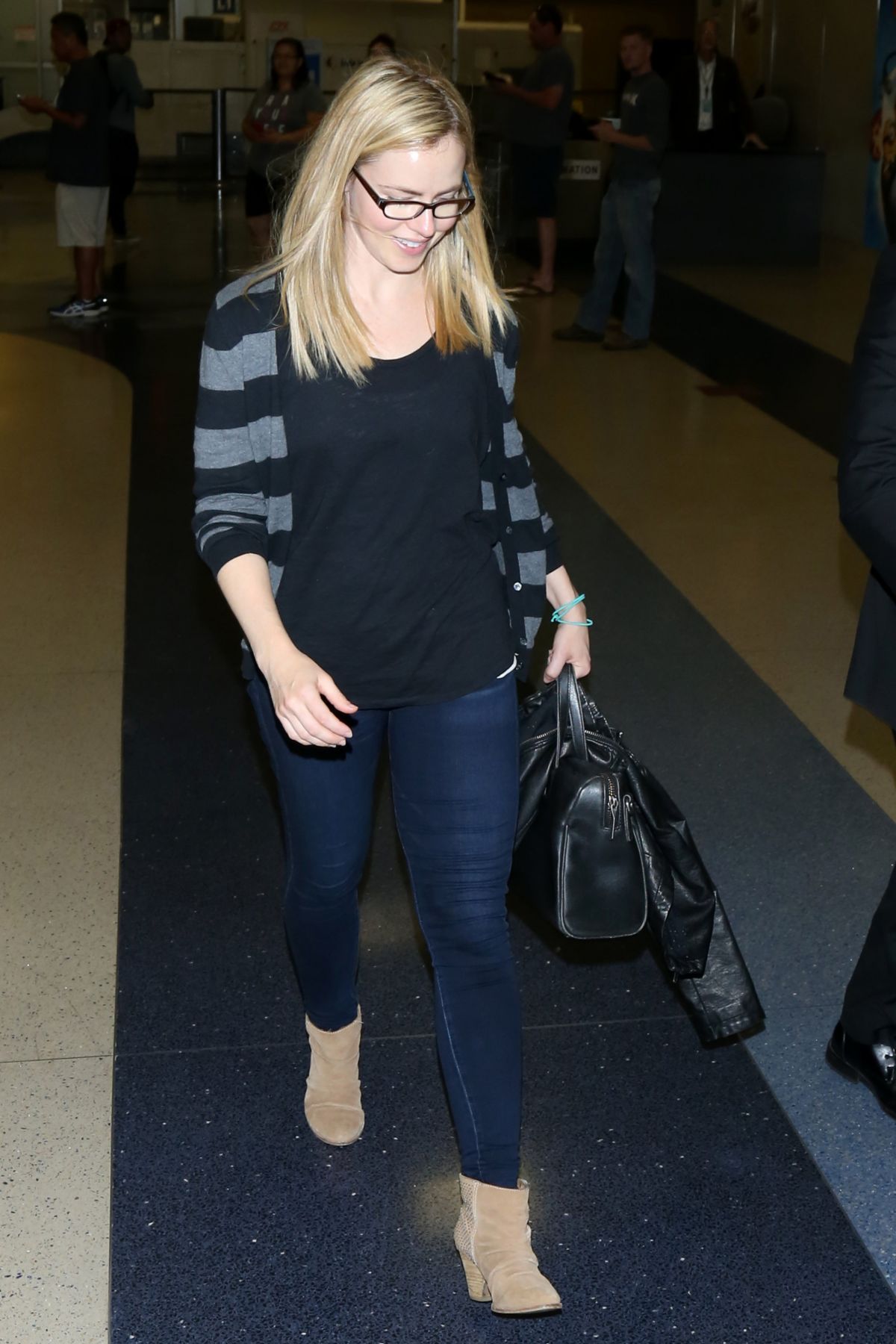 AMANDA SCHULL at LAX Airport in Los Angeles 04/24/2016
