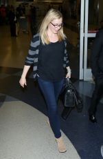 AMANDA SCHULL at LAX Airport in Los Angeles 04/24/2016