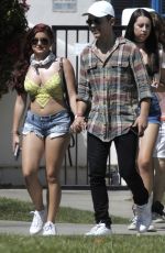 ARIEL WINTER in Bikini Top and Daisy Duke Leaving a Hotel at Coachella 04/23/2016