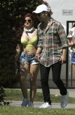 ARIEL WINTER in Bikini Top and Daisy Duke Leaving a Hotel at Coachella 04/23/2016