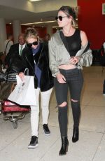 ASHLEY BENSON at LAX Airport in Los Angeles 04/08/2016