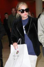 ASHLEY BENSON at LAX Airport in Los Angeles 04/08/2016