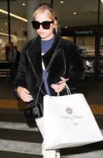 ASHLEY BENSON at LAX Airport in Los Angeles 04/08/2016