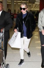 ASHLEY BENSON at LAX Airport in Los Angeles 04/08/2016