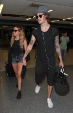 ASHLEY TISDALE at Los Angeles International Airport 04/25/2016