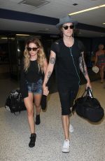 ASHLEY TISDALE at Los Angeles International Airport 04/25/2016