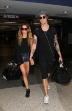 ASHLEY TISDALE at Los Angeles International Airport 04/25/2016