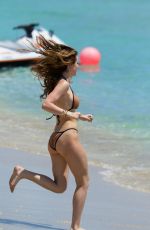 BELLA and DANI THORNE in Bikinis on the Beach in Miami 04/08/2016
