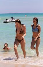 BELLA and DANI THORNE in Bikinis on the Beach in Miami 04/08/2016