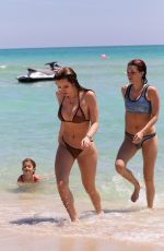 BELLA and DANI THORNE in Bikinis on the Beach in Miami 04/08/2016