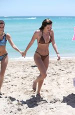 BELLA and DANI THORNE in Bikinis on the Beach in Miami 04/08/2016