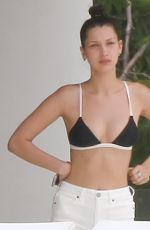 BELLA HADID in Bikini Top at a Pool in St. Barts 04/01/2016