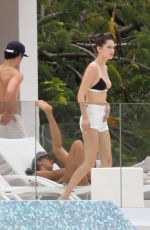 BELLA HADID in Bikini Top at a Pool in St. Barts 04/01/2016