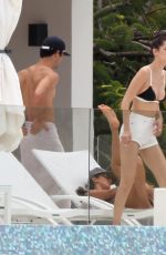 BELLA HADID in Bikini Top at a Pool in St. Barts 04/01/2016