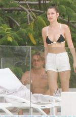 BELLA HADID in Bikini Top at a Pool in St. Barts 04/01/2016