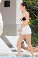 BELLA HADID in Bikini Top at a Pool in St. Barts 04/01/2016
