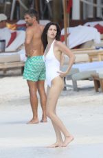 BELLA HADID in Swimsuit at a Beach in St. Barts 04/02/2016