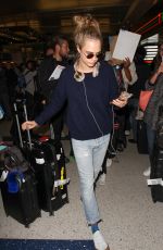 CARA DELEVINGNE at LAX Airport in Los Angeles 04/08/2016