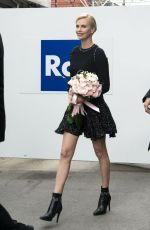 CHARLIZE THERON Out and About in Milan 03/31/2016
