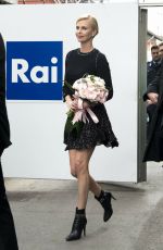 CHARLIZE THERON Out and About in Milan 03/31/2016