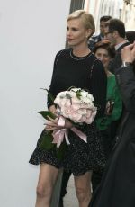 CHARLIZE THERON Out and About in Milan 03/31/2016