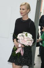 CHARLIZE THERON Out and About in Milan 03/31/2016