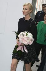 CHARLIZE THERON Out and About in Milan 03/31/2016