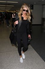 CHARLOTTE MCKINNEY Arrives at LAX Airport in Los Angeles 04/14/2016