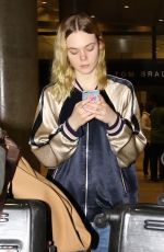 ELLE FANNING at Los Angeles International Airport 04/03/2016