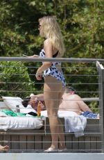ELLIE GOULDING in Swimsuit at a Pool in Miami 04/29/2016