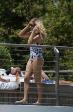 ELLIE GOULDING in Swimsuit at a Pool in Miami 04/29/2016