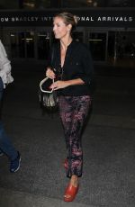 HEIDI KLUM at Los Angeles International Airport 04/25/2016