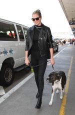 KATE UPTON at LAX Airport in Los Angeles 04/13/2016