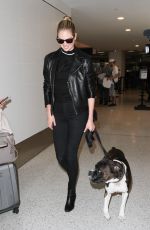 KATE UPTON at LAX Airport in Los Angeles 04/13/2016