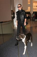 KATE UPTON at LAX Airport in Los Angeles 04/13/2016