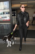 KATE UPTON at LAX Airport in Los Angeles 04/13/2016