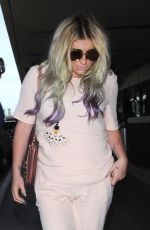 KESHA SEBERT Arrives at LAX Airport in Los Angeles 04/15/2016