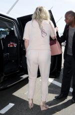 KESHA SEBERT Arrives at LAX Airport in Los Angeles 04/15/2016