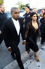 KIM KARDASHIAN and Kanye West Arrives at Isabela Rangel and David Grutman’s Wedding in Miami 04/23/2016