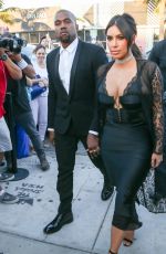 KIM KARDASHIAN and Kanye West Arrives at Isabela Rangel and David Grutman’s Wedding in Miami 04/23/2016