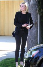 KIRSTEN DUNST Leaves Her House in Los Angeles 04/02/2016