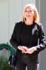 KIRSTEN DUNST Leaves Her House in Los Angeles 04/02/2016
