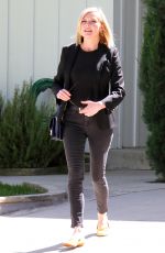 KIRSTEN DUNST Leaves Her House in Los Angeles 04/02/2016