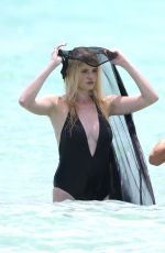 LARA STONE in Bikini on the Set of a Photoshoot in Miami Beach 04/29/2016