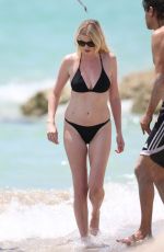 LARA STONE in Bikini on the Set of a Photoshoot in Miami Beach 04/29/2016